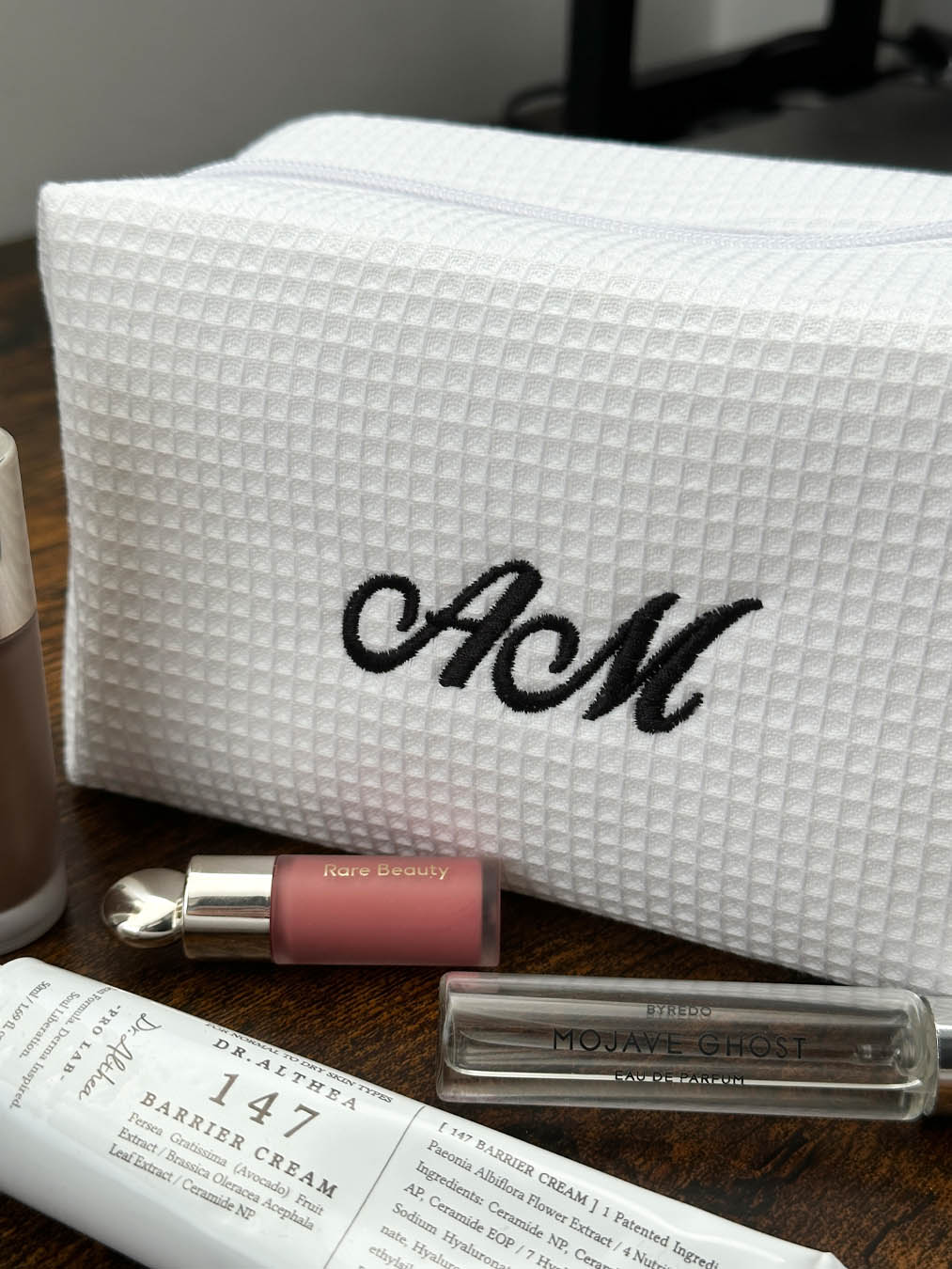 Cosmetic bag with embroidered initials