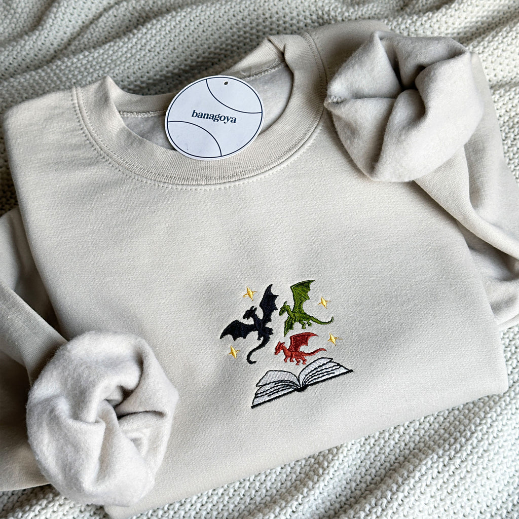 Dragons and book embroidery design