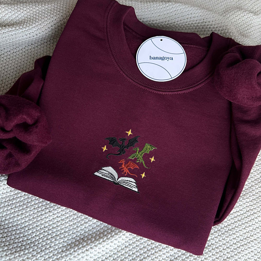 Dragons and book embroidery design