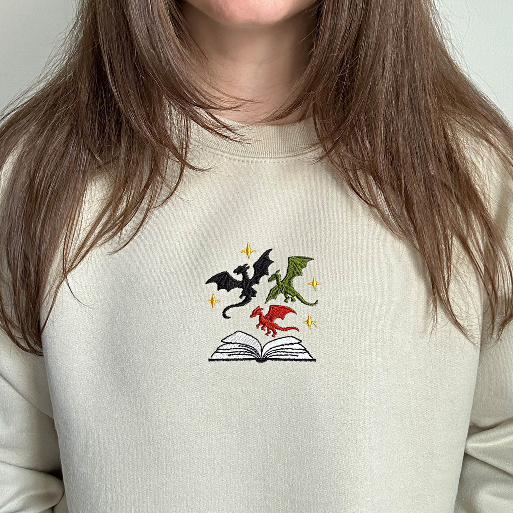 Dragons and book embroidery design