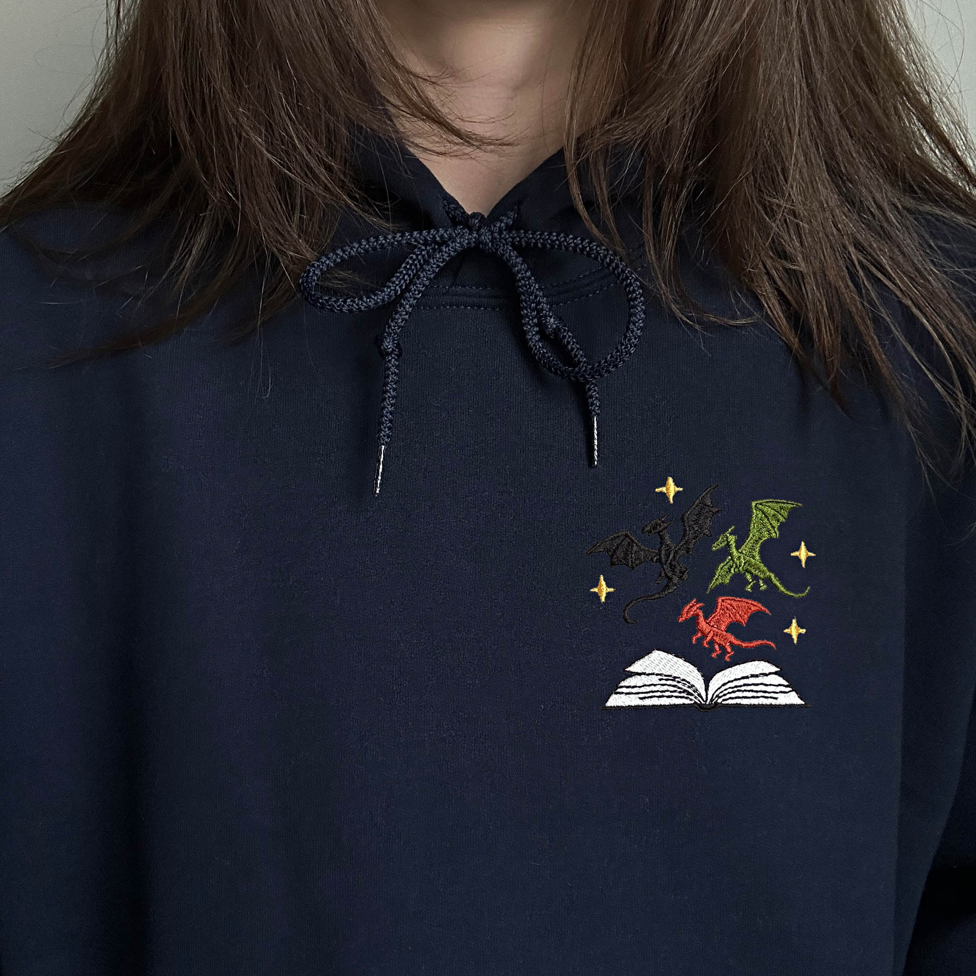 Dragons and book embroidery design