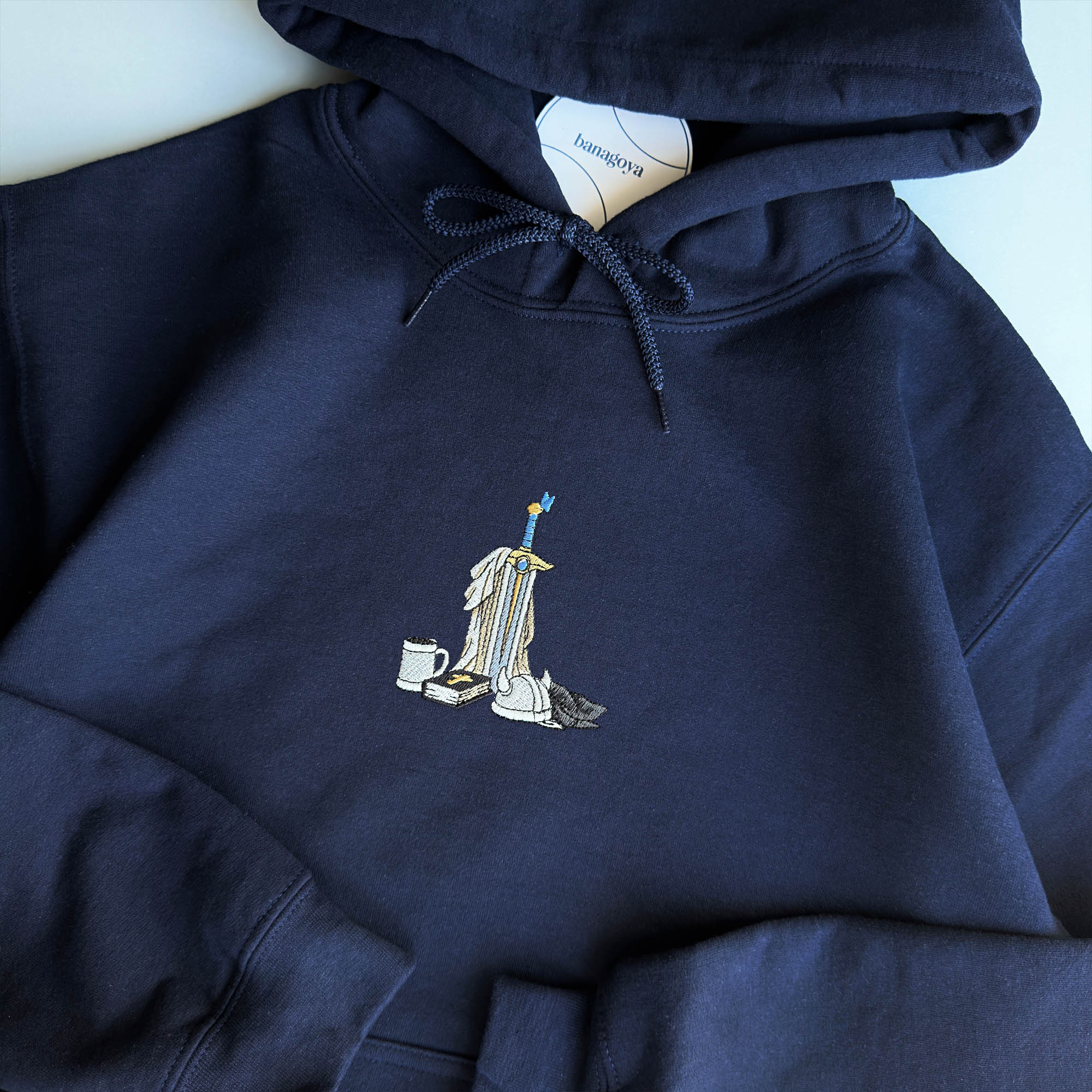 Sword and book embroidery design