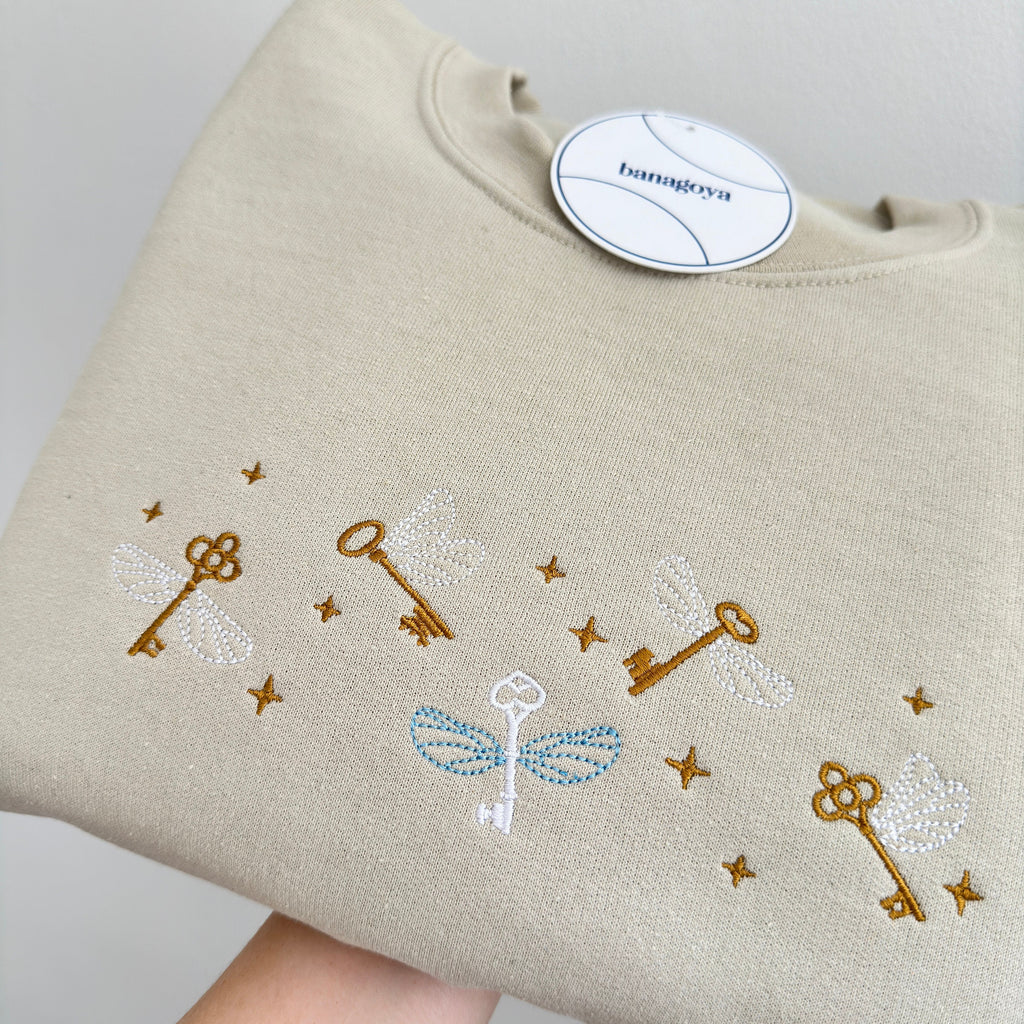 Flying keys embroidery design