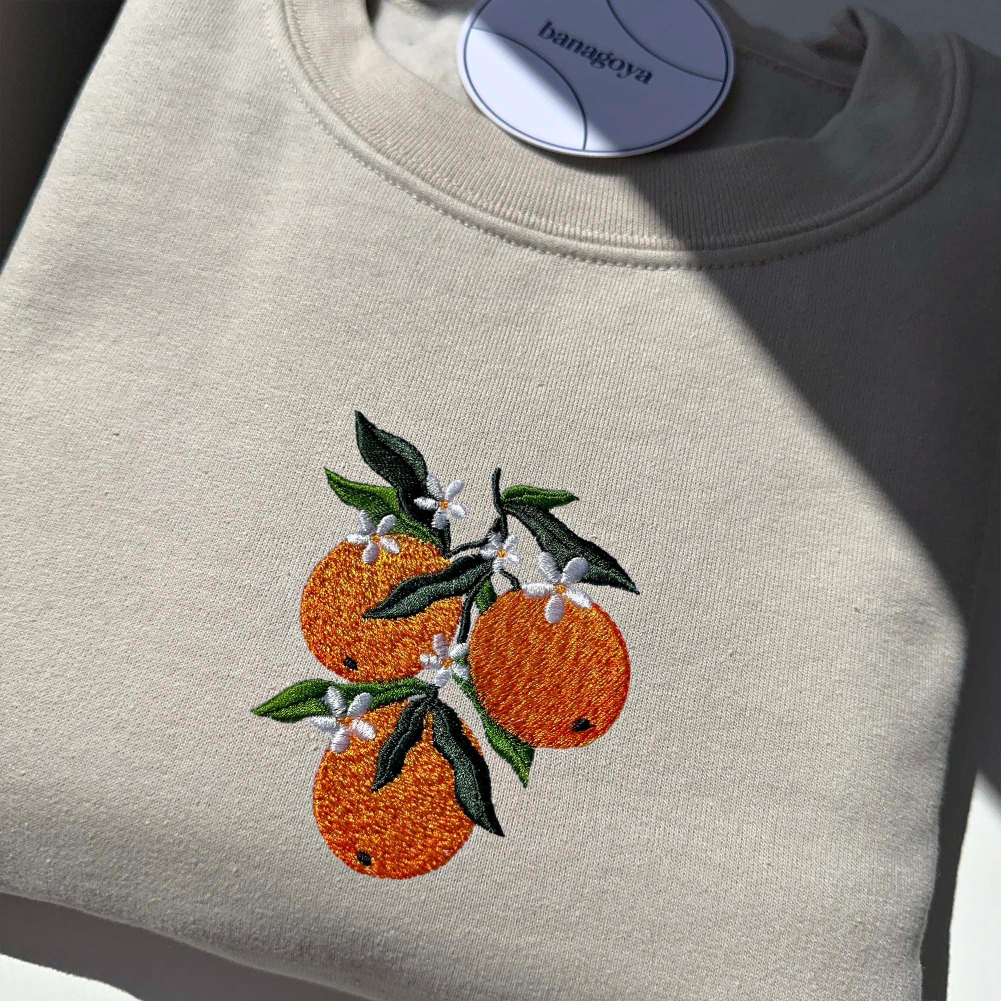 Orange branch embroidery design