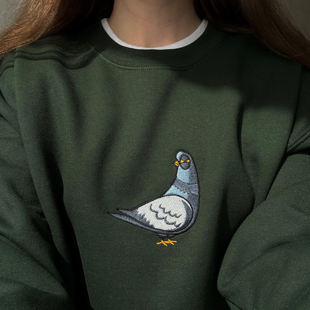 Suspicious pigeon embroidery design