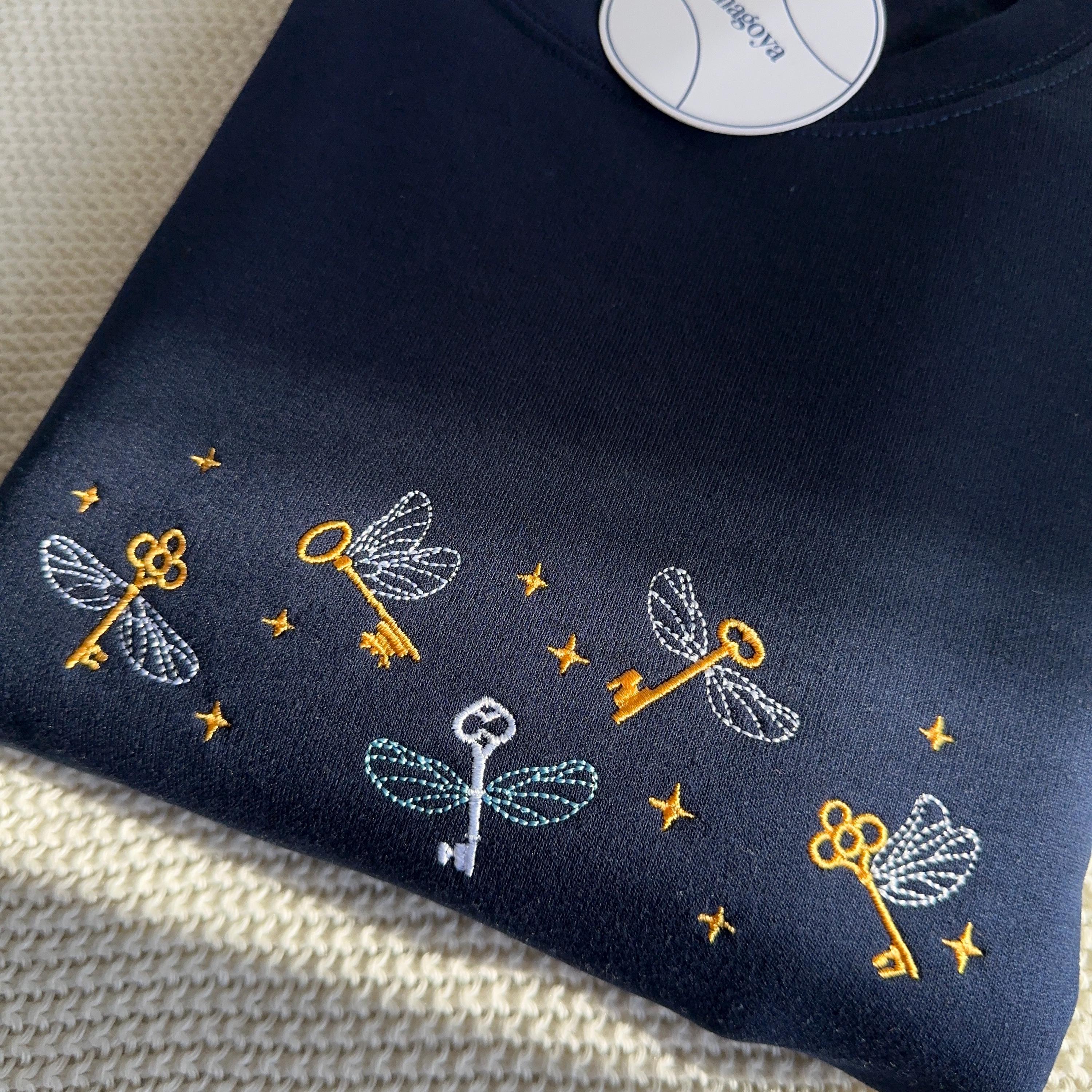 Flying keys embroidery design