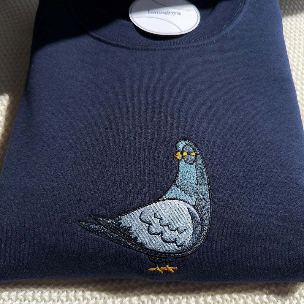 Suspicious pigeon embroidery design