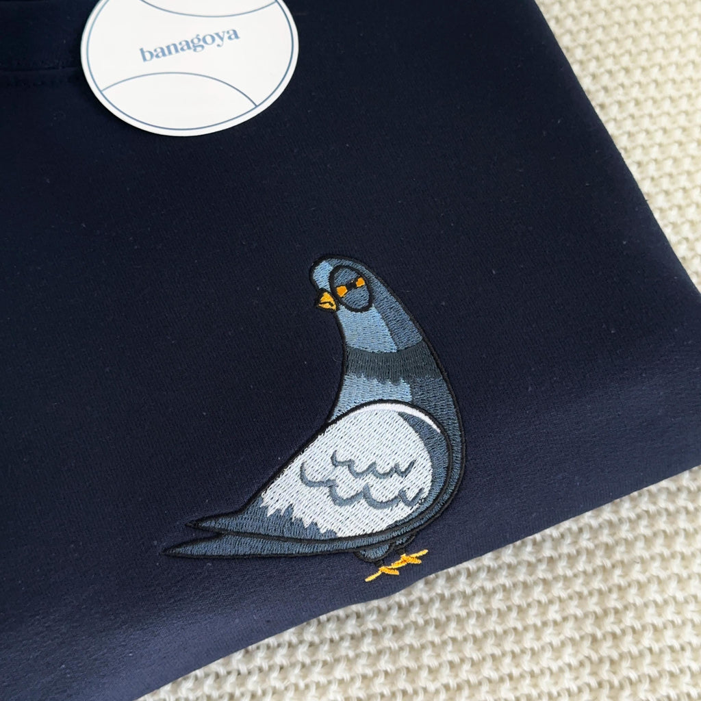 Suspicious pigeon embroidery design