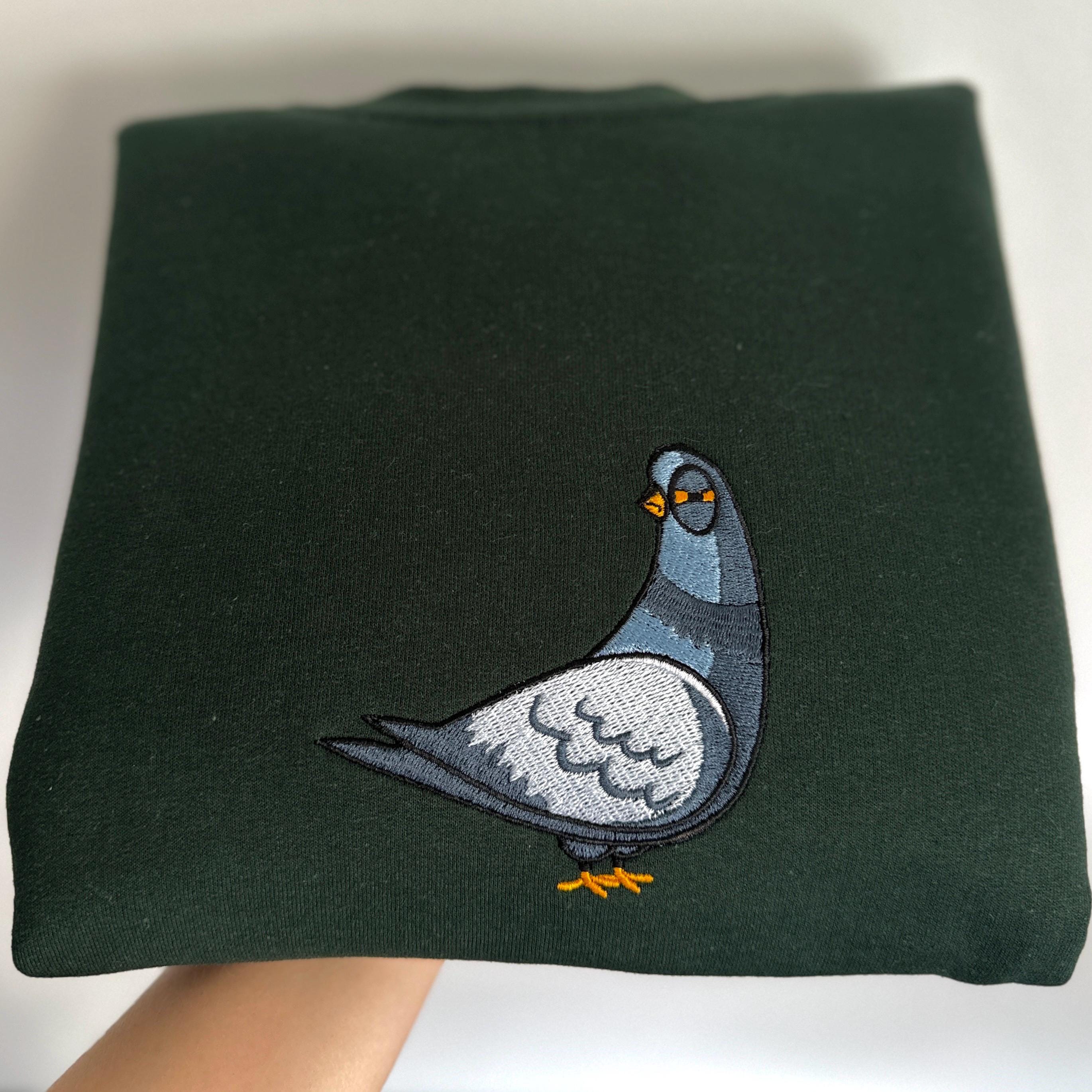 Suspicious pigeon embroidery design