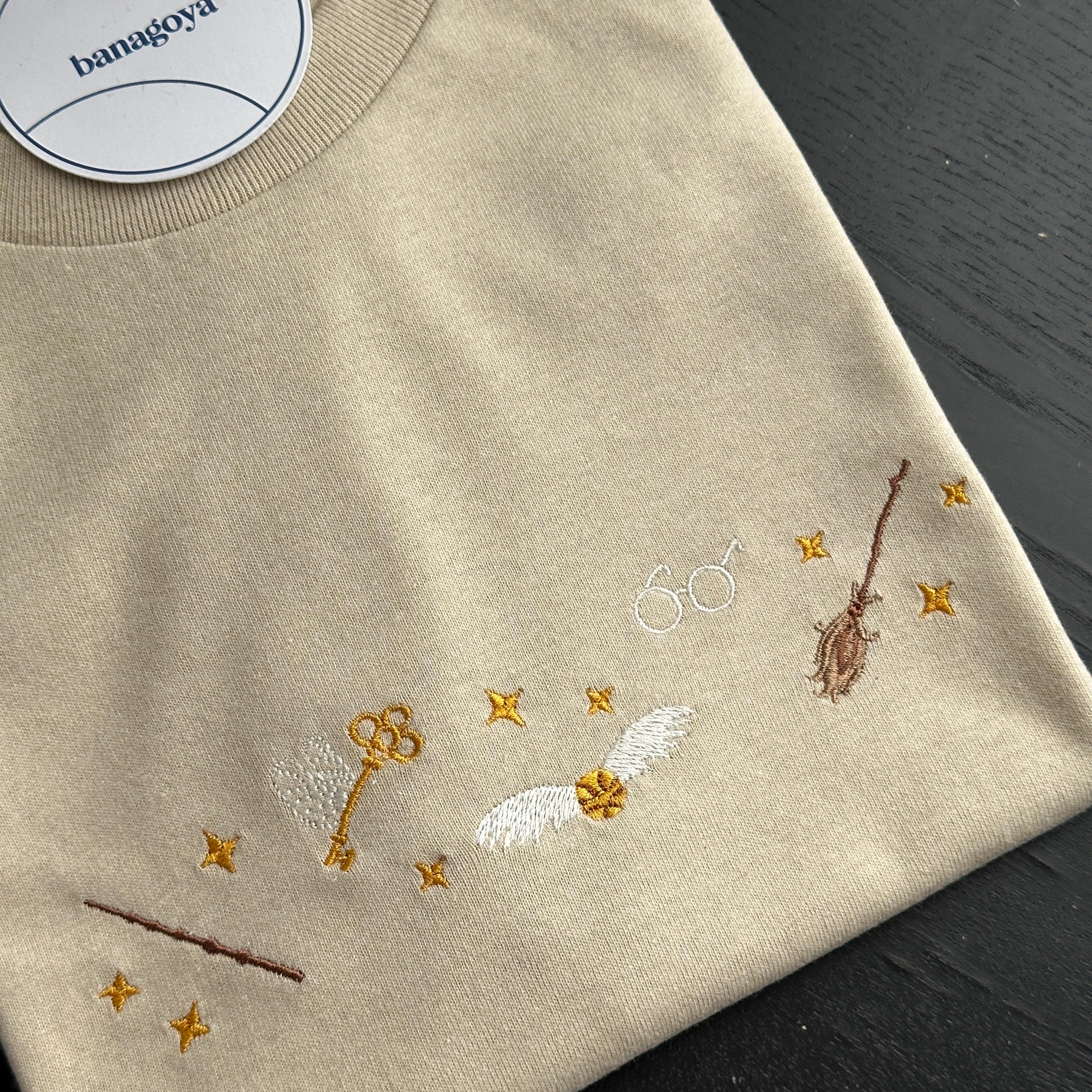 Wizard book embroidery design