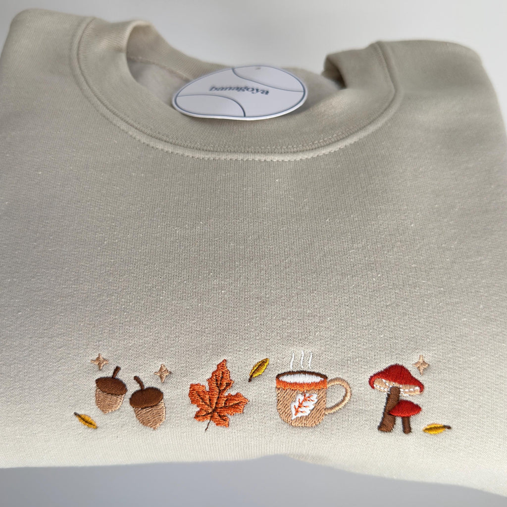 Cozy autumn falling leaves embroidery design