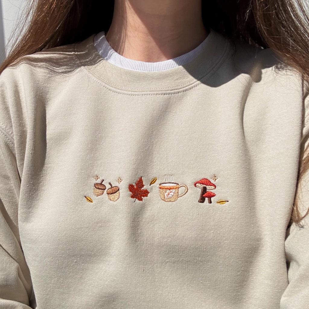 Cozy autumn falling leaves embroidery design