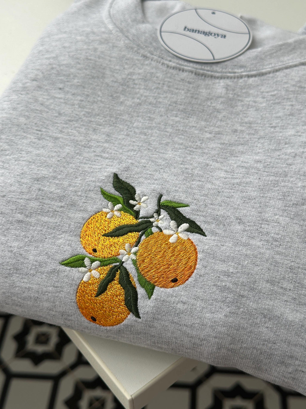 Orange branch embroidery design