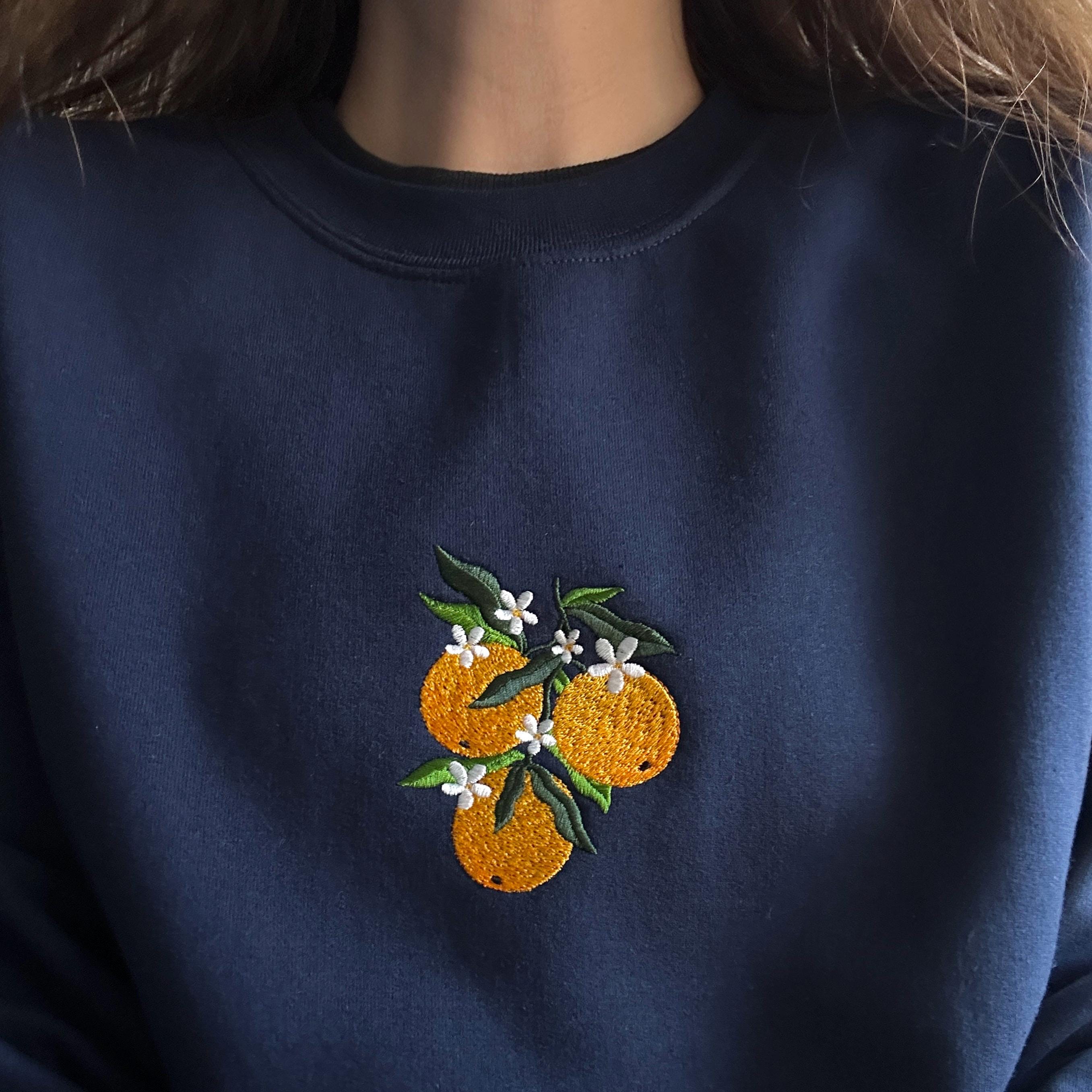 Orange branch embroidery design